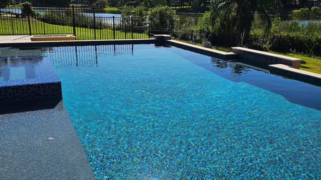 pool lined with mosaic tile